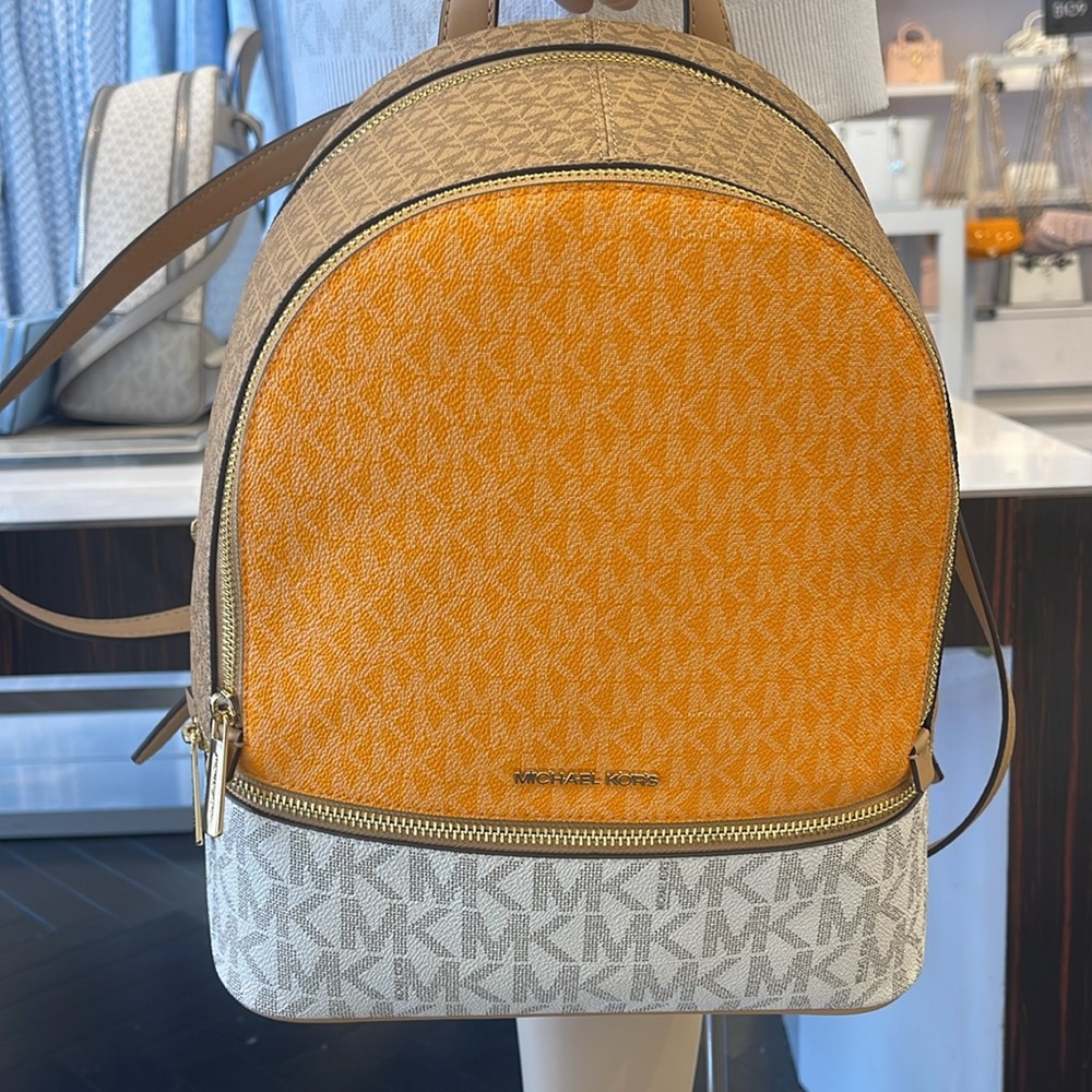 MICHAEL KORS Rhea Medm Zip Color-Block Signature Logo Backpack
POP ORNG MLT
NWT - Picture 14 of 16